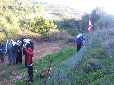 habitantes de aita ashaab izan banderas de hezbola